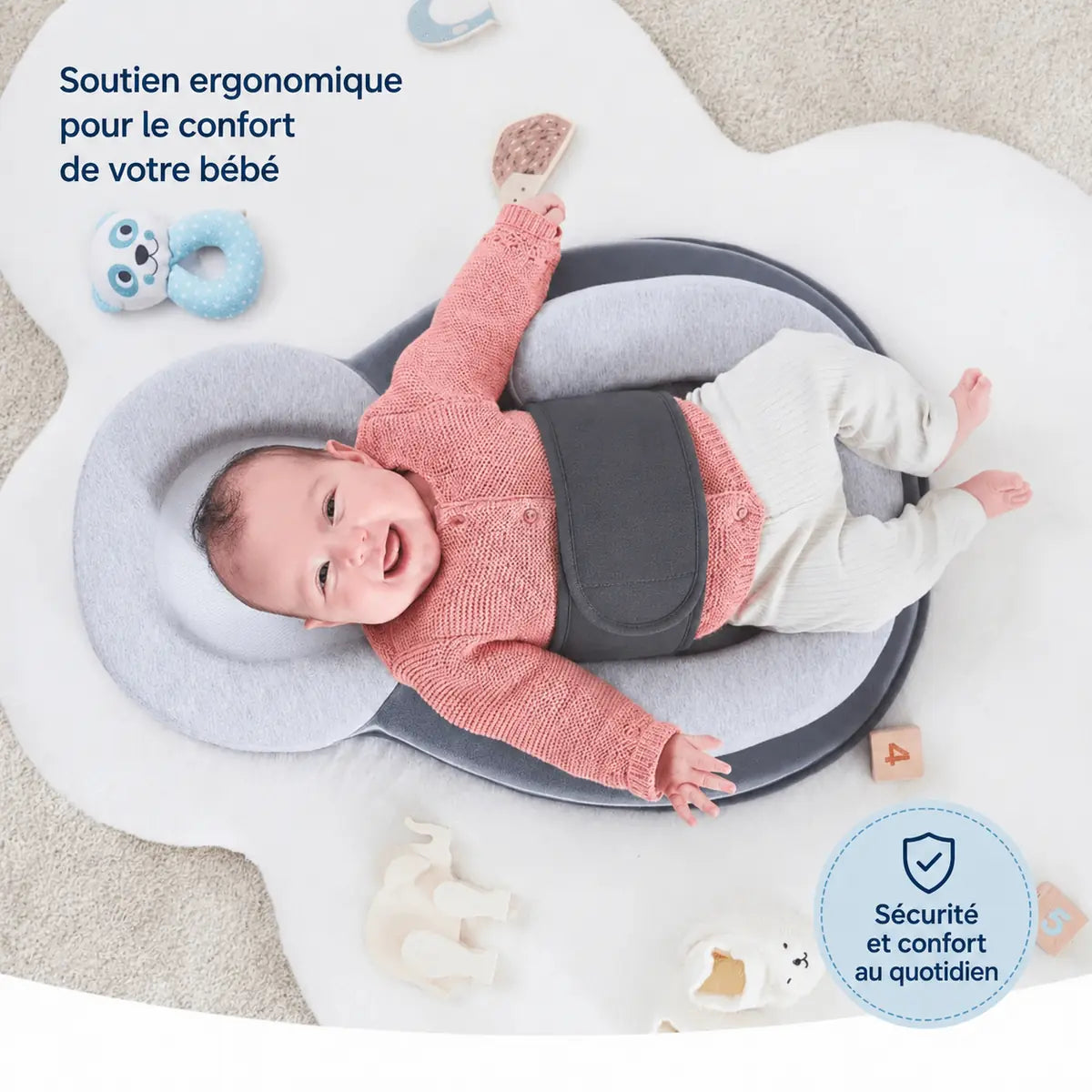 Visuel publicitaire du Cocon, bébé souriant vu de dessus, texte « Soutien ergonomique pour le confort de votre bébé »